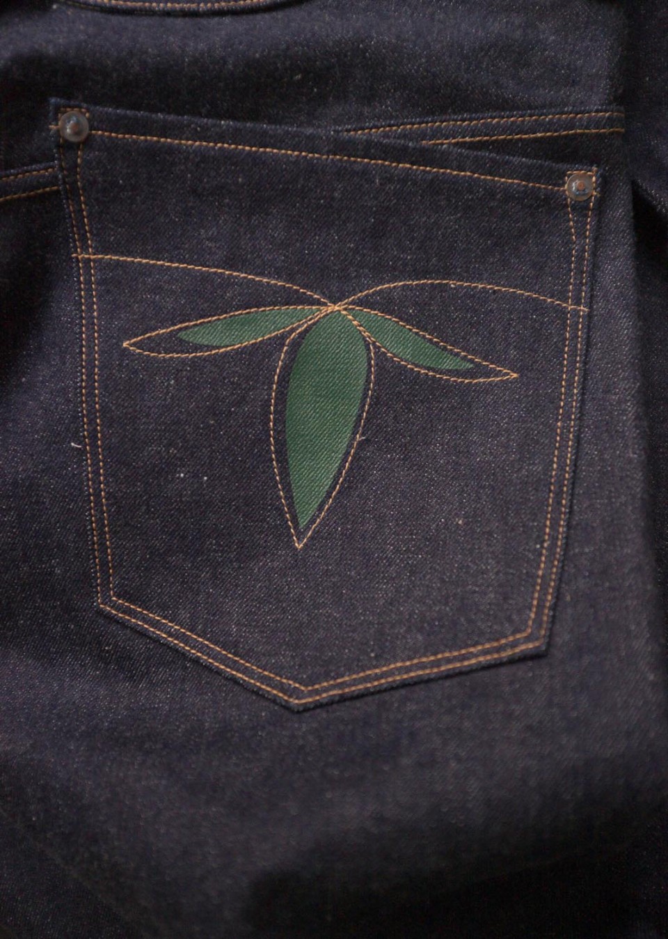 Stitched and painted arcuate on Brown-Duck & Digger Rough Rider Jeans