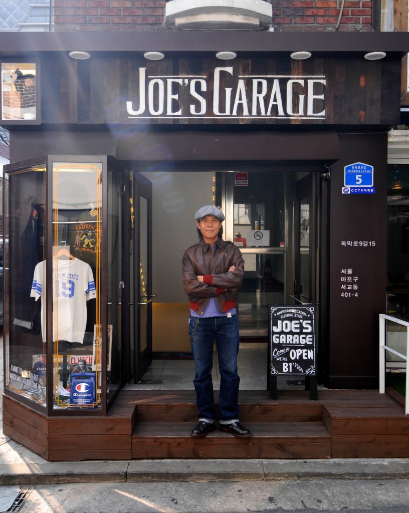 Joe of Joe's Garage in South Korea standing outside his shop