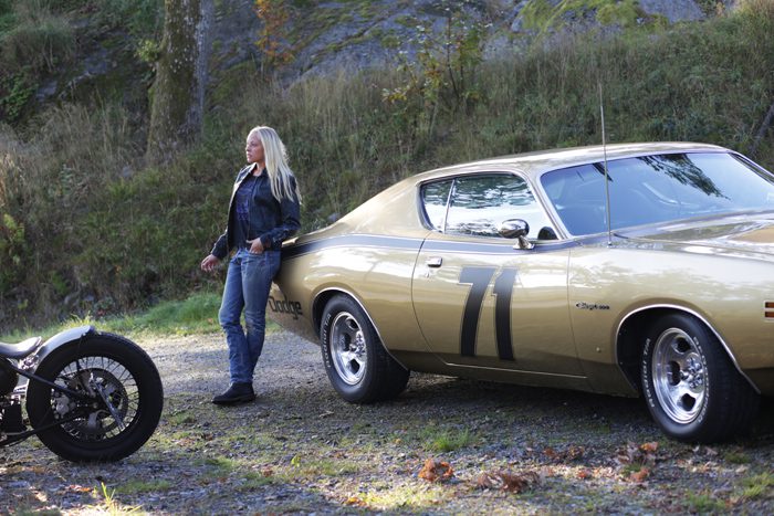 Still shot from Lost In Paradise filming of Dodge Charger and girl