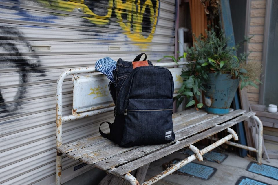 Momotaro Going To Battle backpack Japanese denim (outdoor shot)